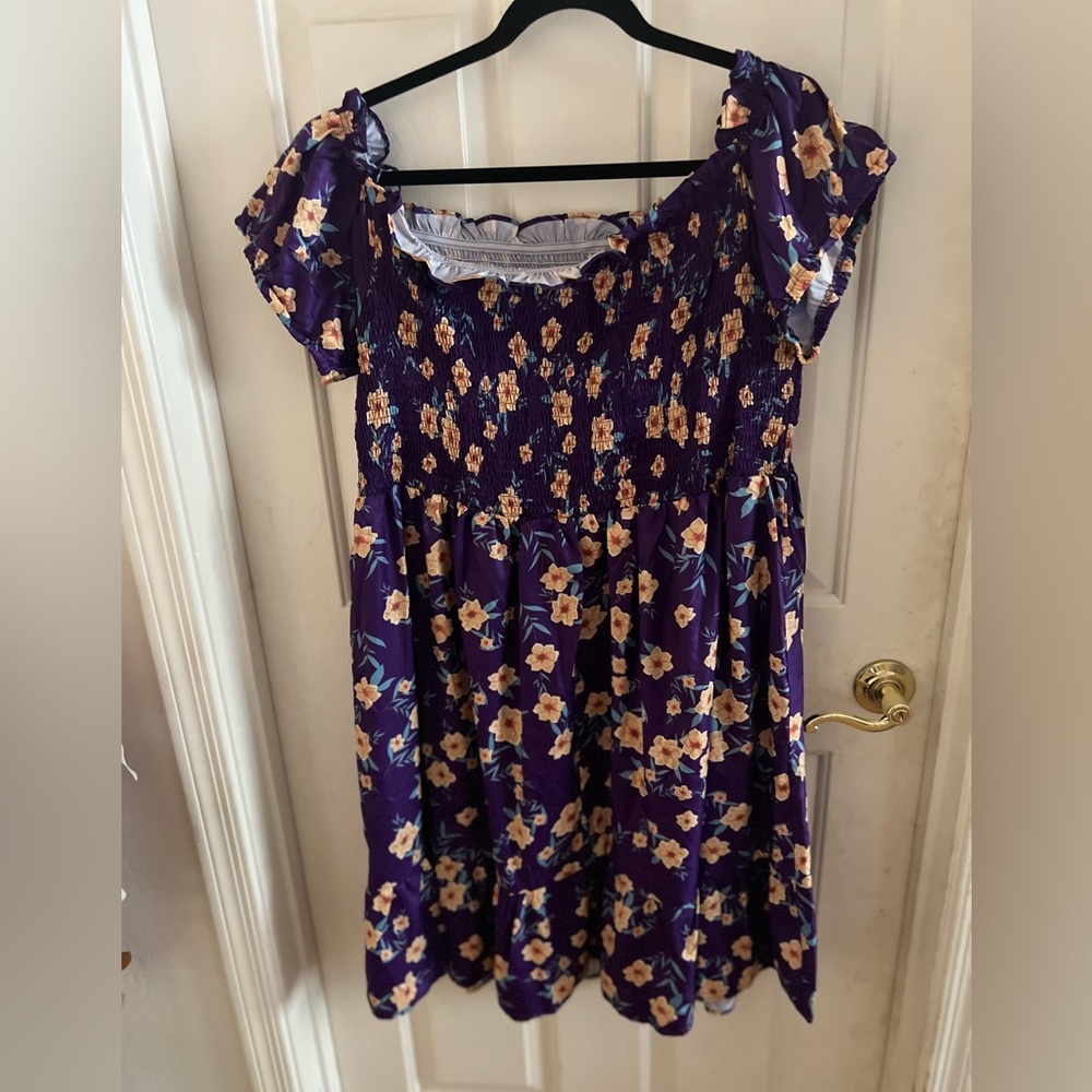 NWOT purple and yellow smocked top dress. Polyester size 2x
